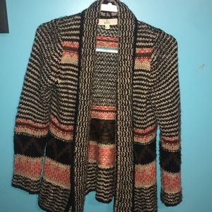 Very cute knitted cardigan.